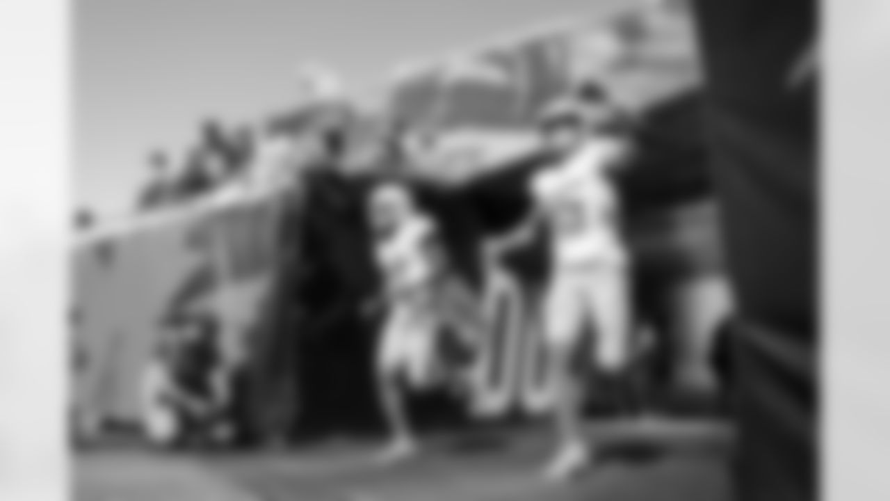 WR Derius Davis (12) and WR Ladd McConkey (15)