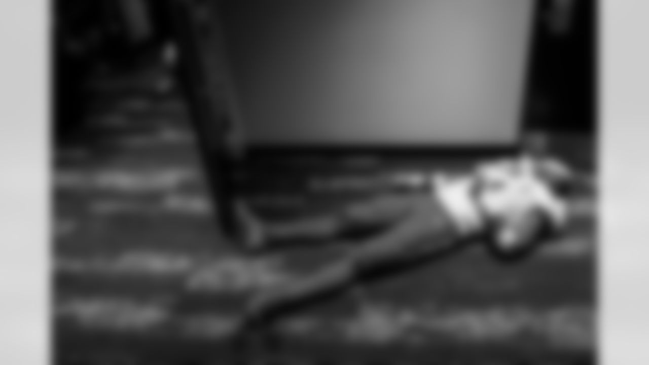 Flu Game - Another from Week 2 in Las Vegas, this one a storytelling image of a warrior that gave it his all. Daiyan Henley was feeling terrible and had doubts whether he would play with a bad illness. The result? A team-leading 10 tackles, a sack, an interception, two tackles for loss and two passes defensed. In the locker room huddle, he was clearly spent after leaving it all on the field. I got done shooting Derwin going around congratulating everyone and was exiting the back of the locker room to the hallway where we set up our gear at the stadium. I look to my left and see Daiyan flat on his back.