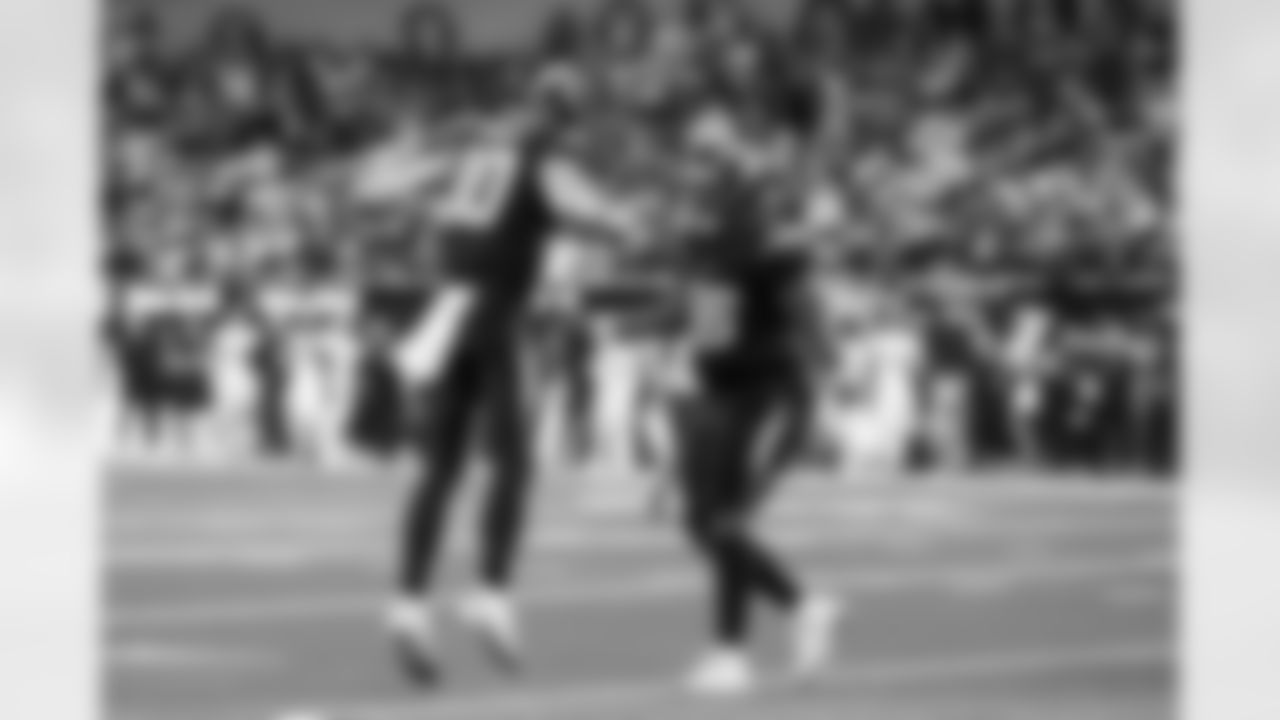 QB Justin Herbert (10) and T Bobby Hart (66)