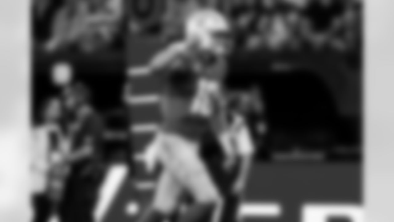 Chargers QB Justin Herbert (#10) in action during their Pro Bowl season.