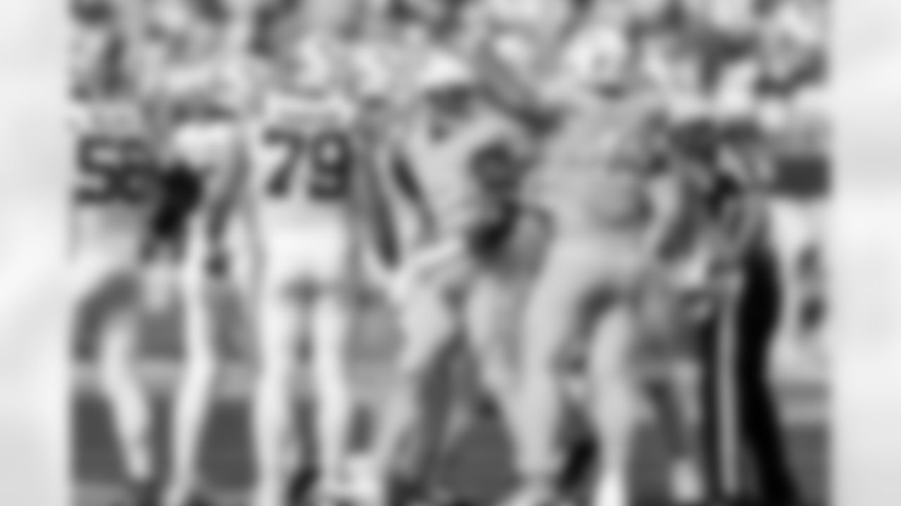 OLB Khalil Mack (52) and OLB Tuli Tuipulotu (45)