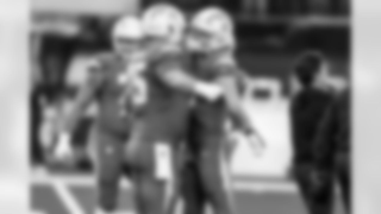 C Bradley Bozeman (75) and QB Justin Herbert (10)