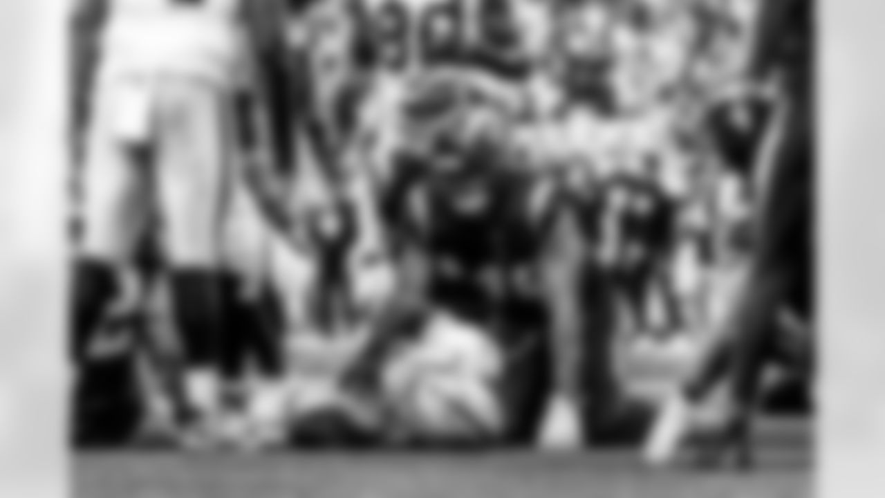 Take a look back at the Chargers Week 13 matchup with the Raiders in monochrome.