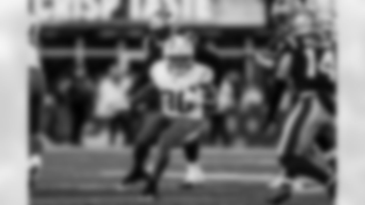 Check out the best shots from the Chargers Wild Card matchup against the Patriots!