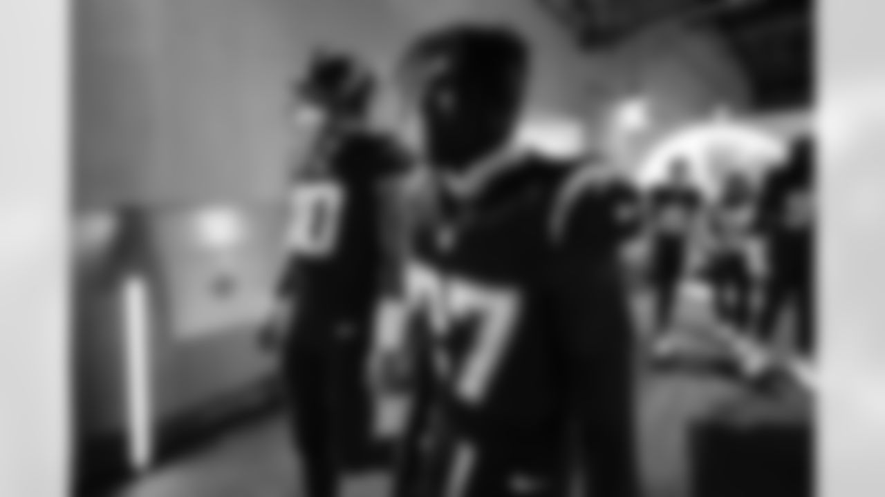 QB Justin Herbert (10) and S RJ Mickens (27)