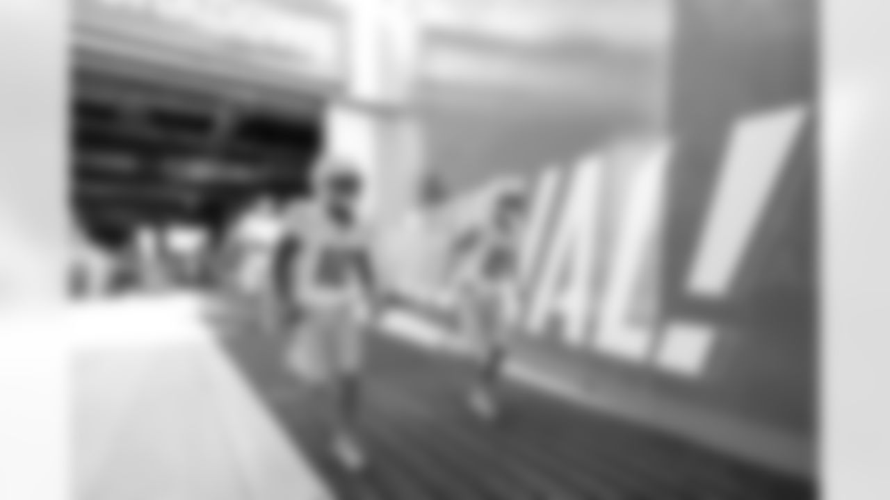 WR Derius Davis (12) and WR Ladd McConkey (15)