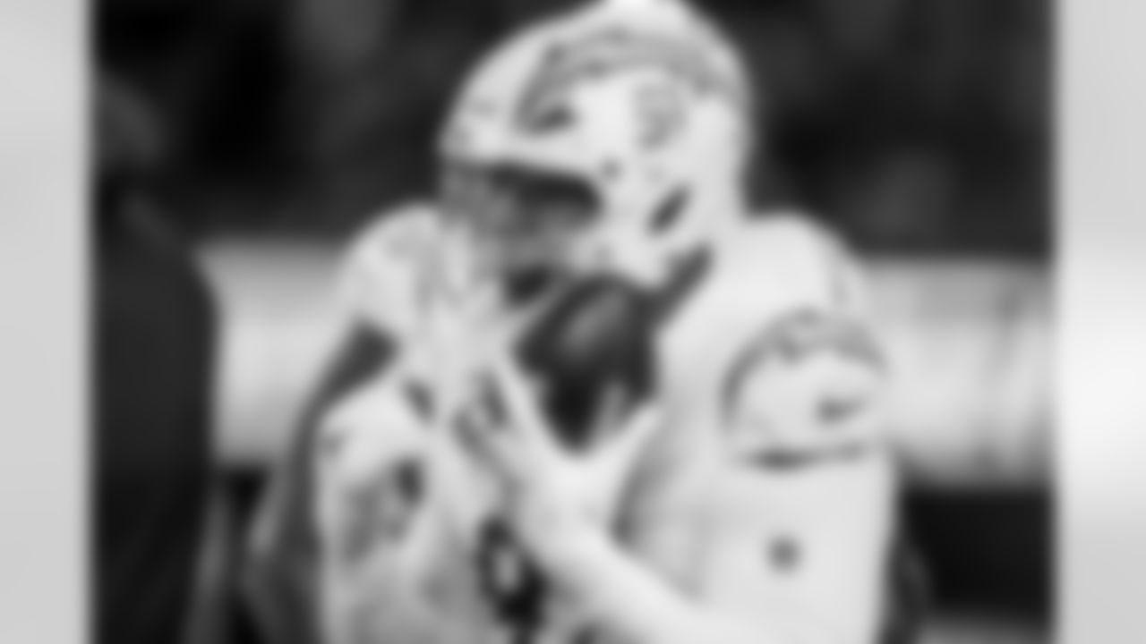 Check out the best shots from the Chargers Wild Card matchup against the Patriots!