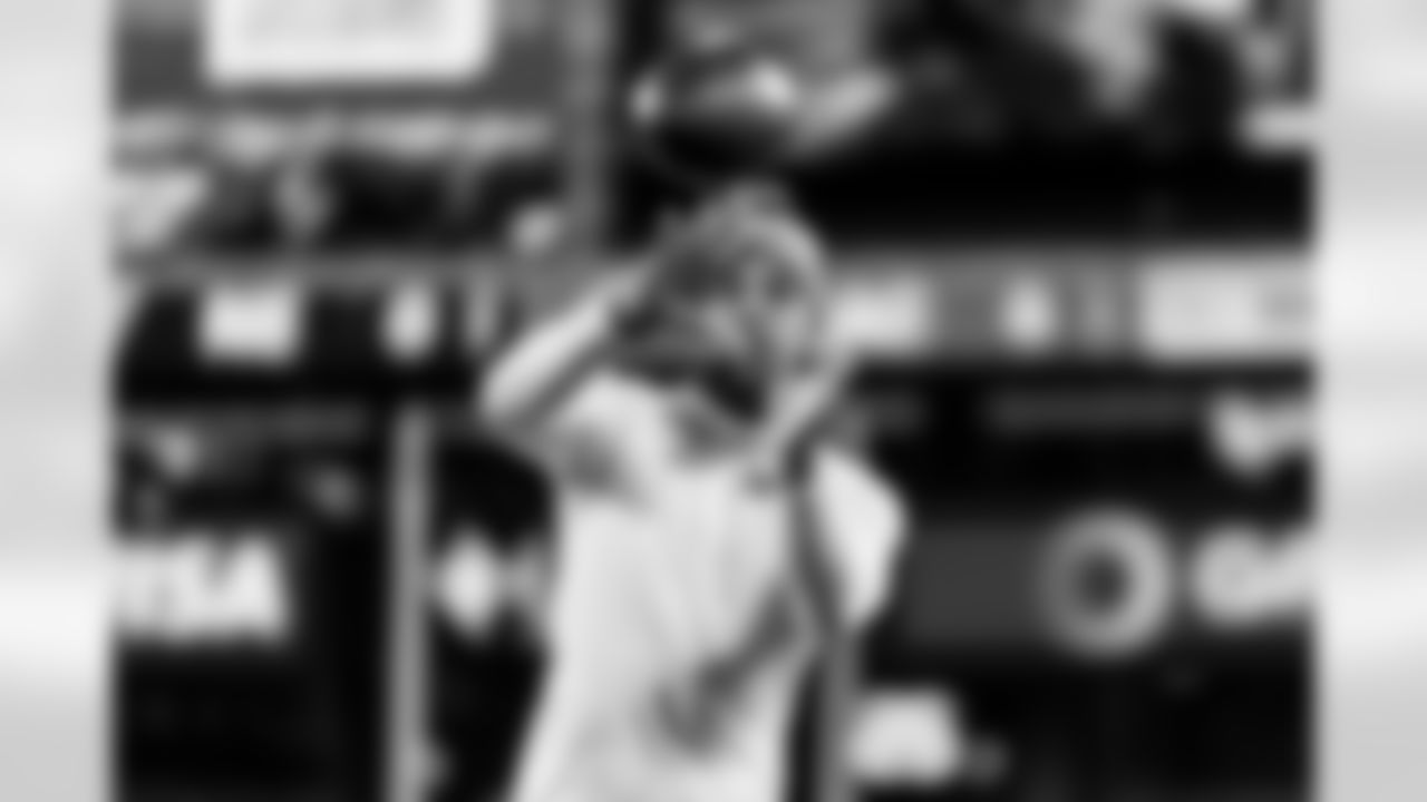 Check out the best shots from the Chargers Wild Card matchup against the Patriots!