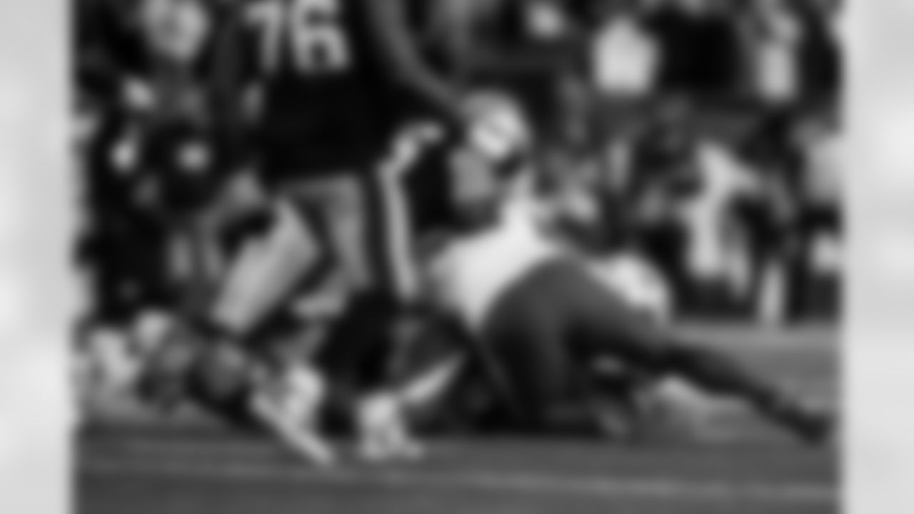 Check out the best shots from the Chargers Wild Card matchup against the Patriots!