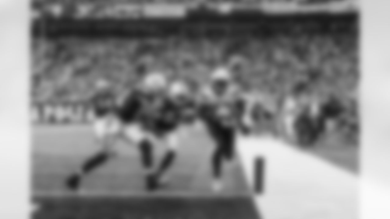 Relive the Chargers' postseason appearances through images from playoff games, highlighting the moments that defined the team in the NFL playoffs.