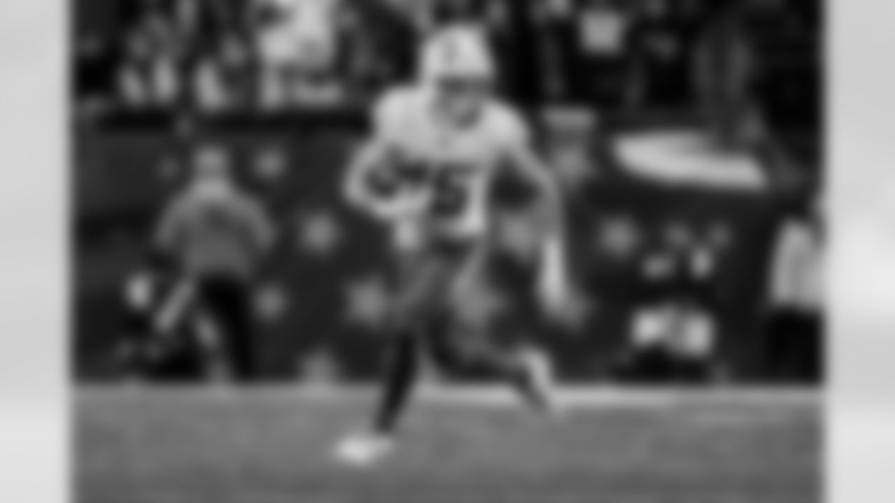 Check out the best shots from the Chargers Wild Card matchup against the Patriots!