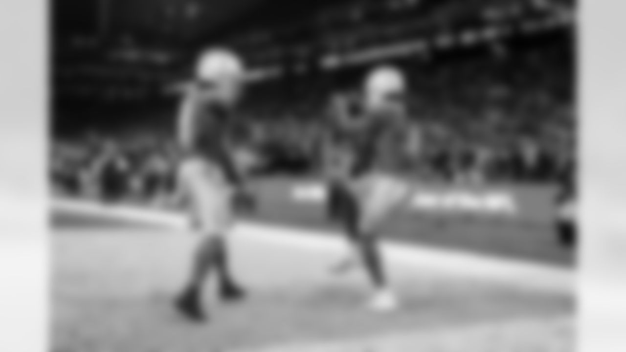 RB Omarion Hampton (8) and WR Quentin Johnston (1)