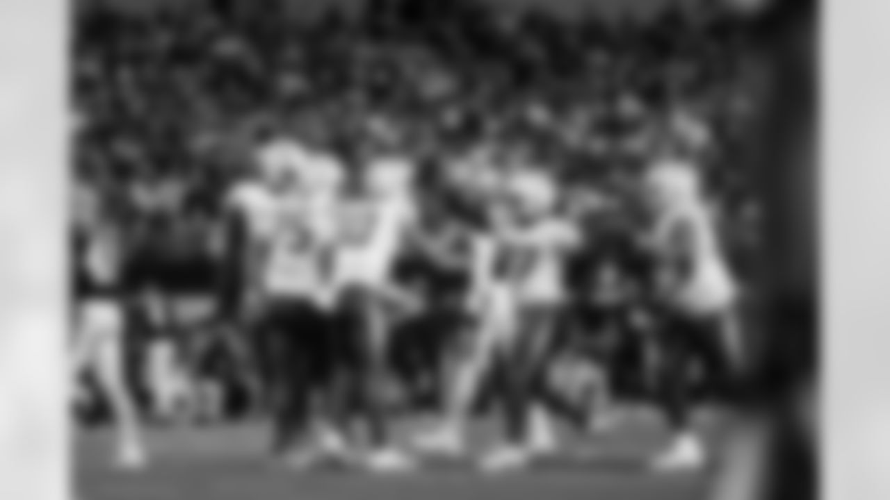 C Bradley Bozeman (75), QB Justin Herbert (10), G Zion Johnson (77) and OL Austin Deculus (74)