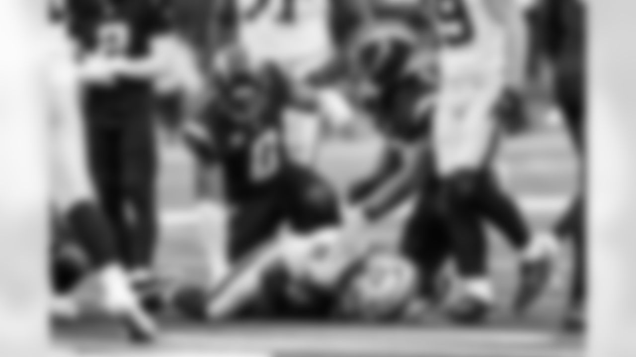 LB Denzel Perryman (6) and LB Daiyan Henley (0)