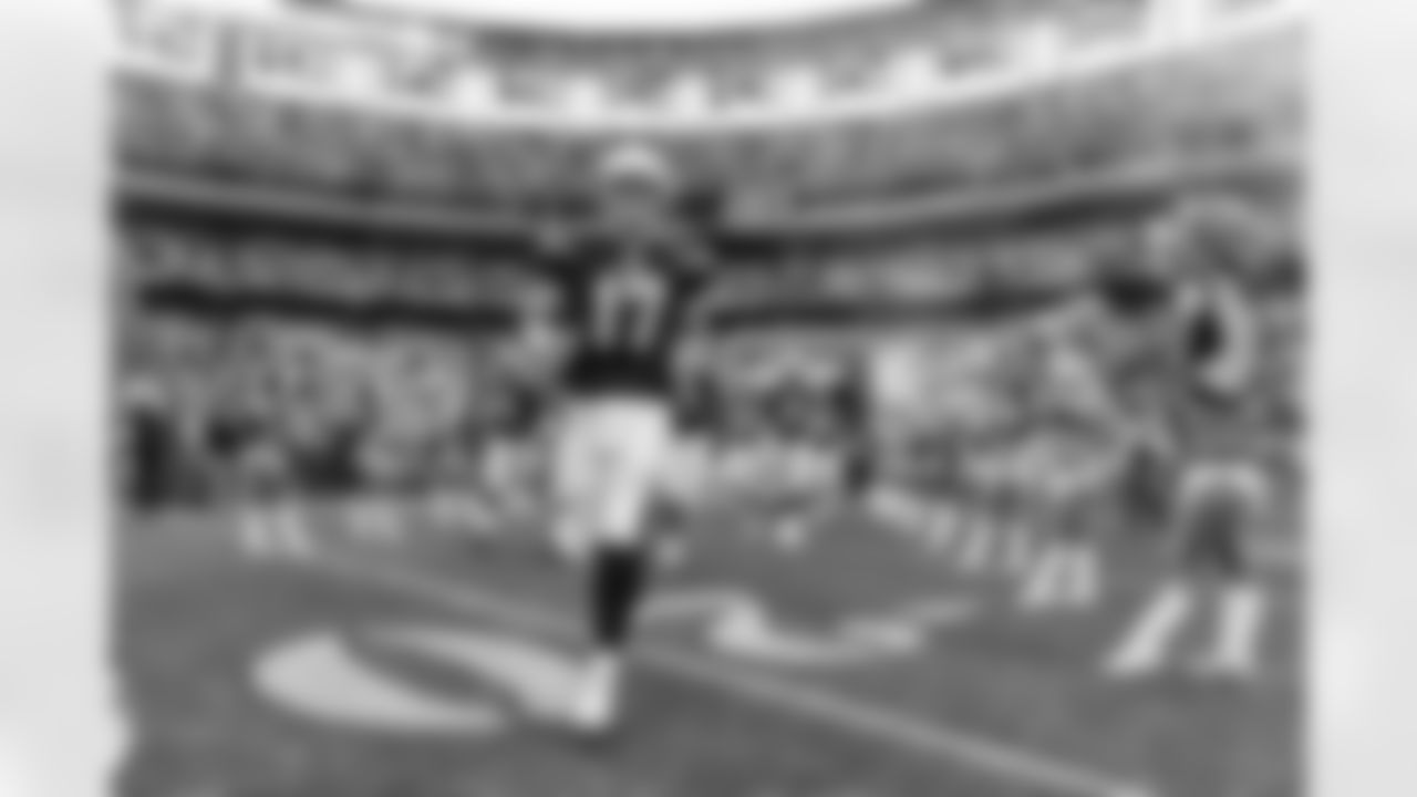 Relive the Chargers' postseason appearances through images from playoff games, highlighting the moments that defined the team in the NFL playoffs.