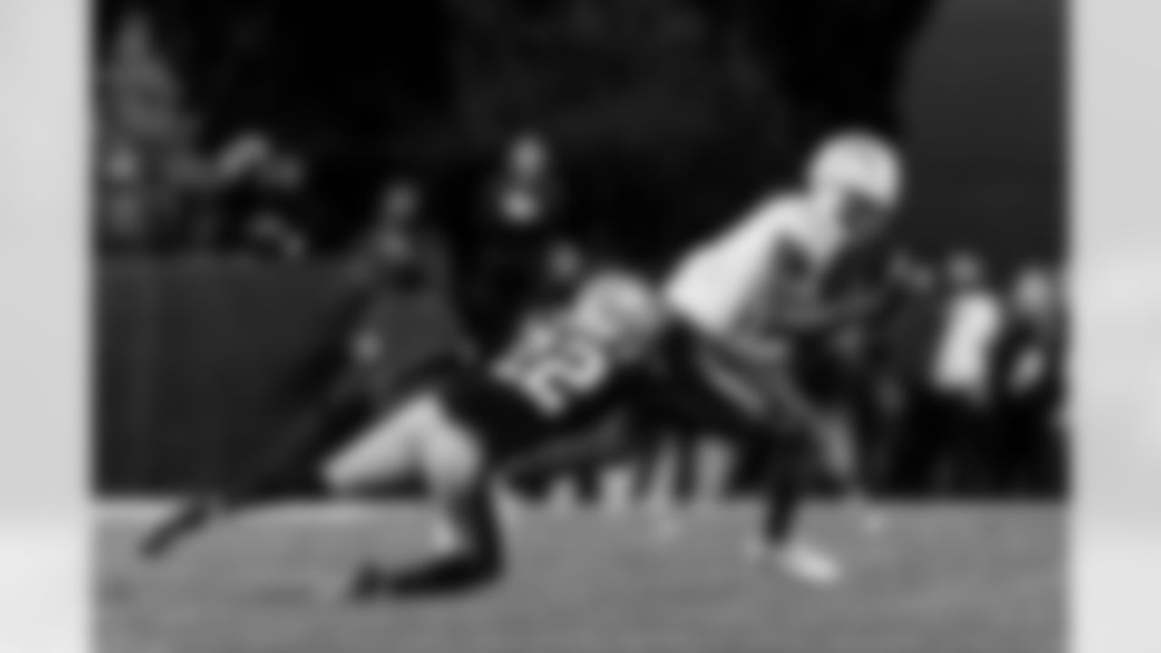 Check out the best shots from the Chargers Wild Card matchup against the Patriots!