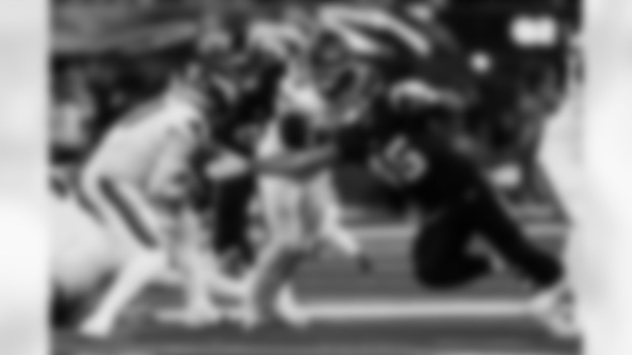 Chargers OLB Tuli Tuipulotu (#45) in action during their Pro Bowl season.