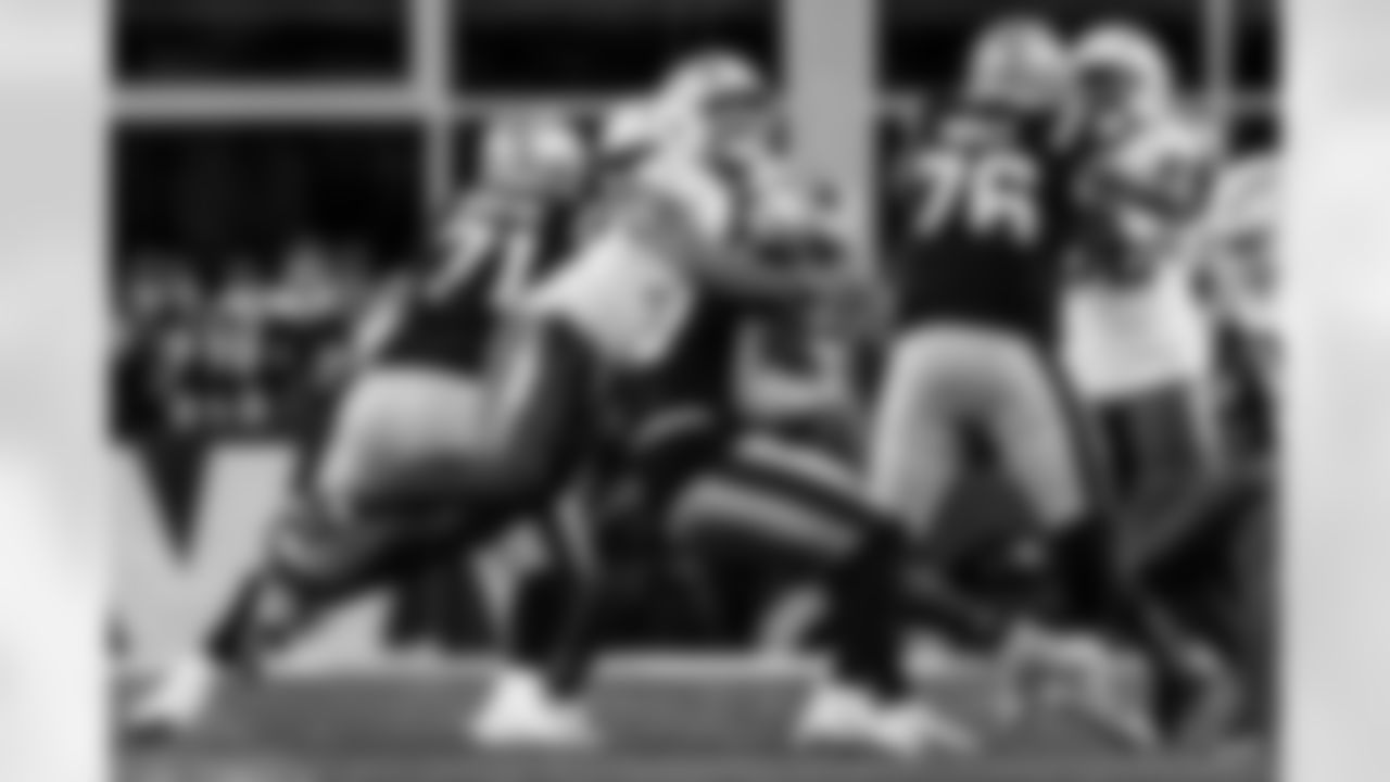 Check out the best shots from the Chargers Wild Card matchup against the Patriots!