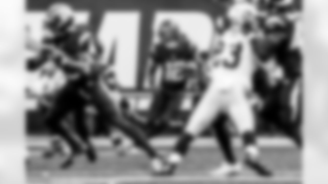 Take a look back at the Chargers Week 13 matchup with the Raiders in monochrome.