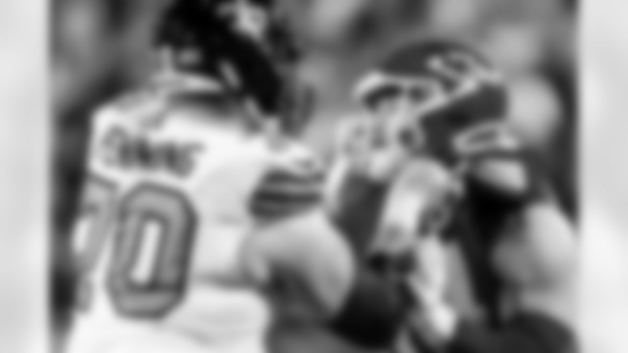 Kansas City Chiefs linebacker Leo Chenal, right, battles against New Orleans Saints offensive tackle Trevor Penning (70) during the second half of an NFL football game, Monday, Oct. 7, 2024 in Kansas City, Mo. The Chiefs defeated the Saints, 26-13. (AP Photo/Reed Hoffmann)