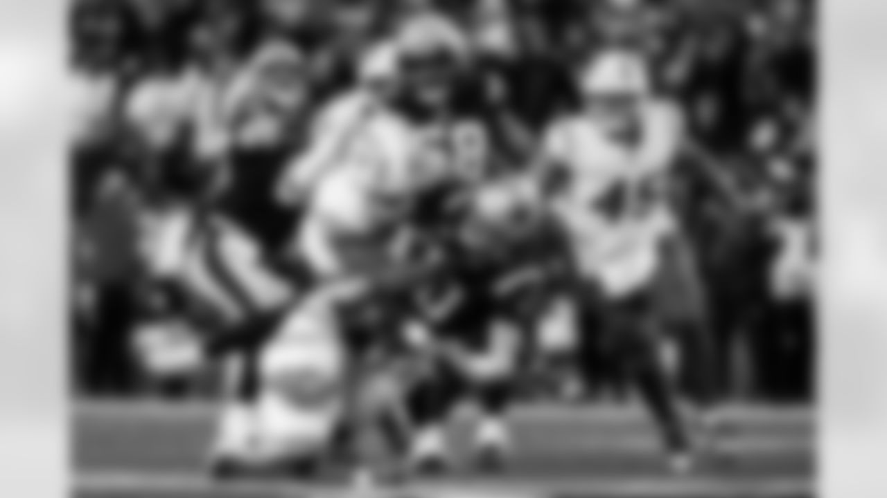 Check out the best shots from the Chargers Wild Card matchup against the Patriots!