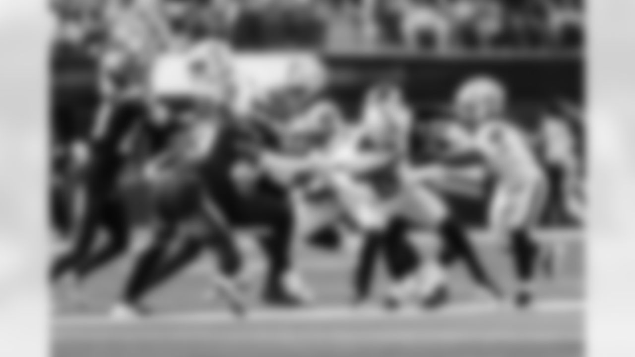 S Derwin James Jr. (3) and LB Daiyan Henley (0)