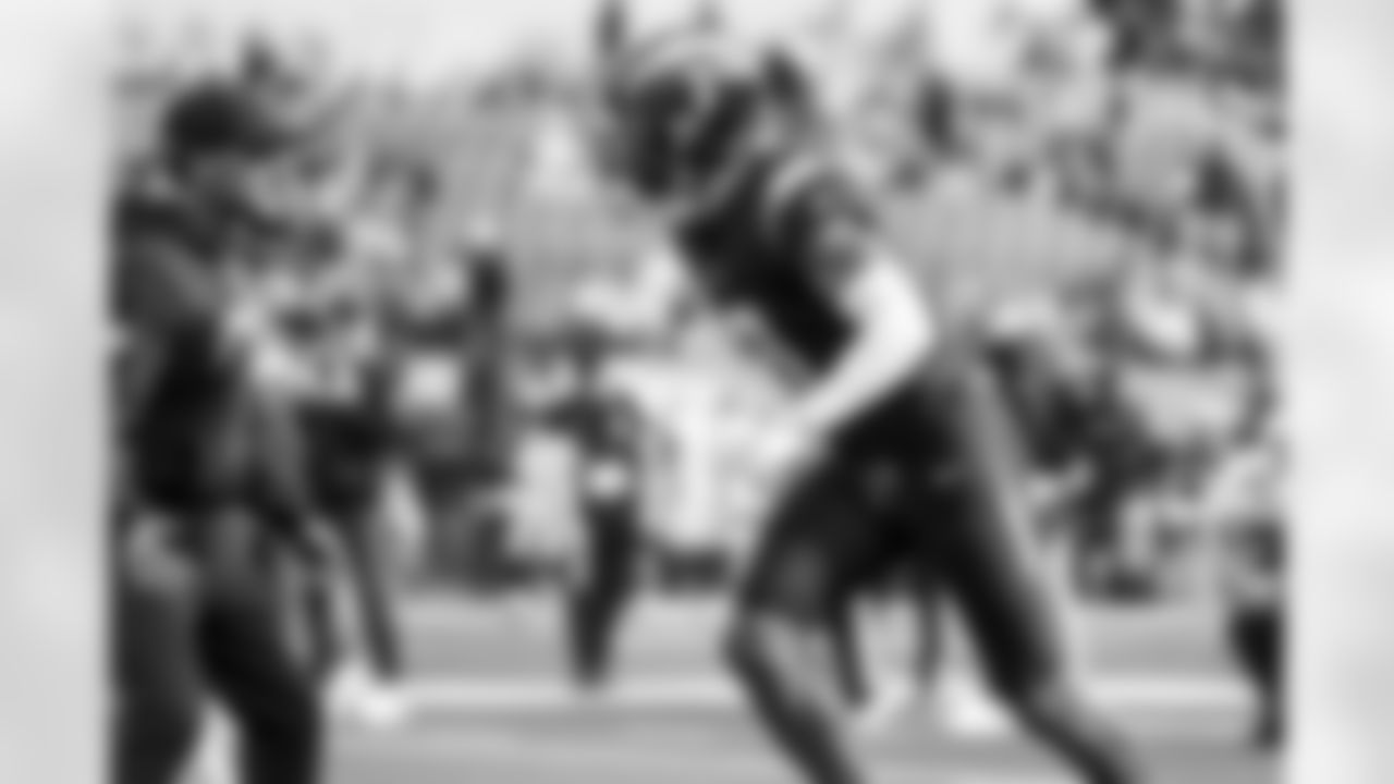 Defensive Coordinator Jesse Minter and S Derwin James Jr. (3)