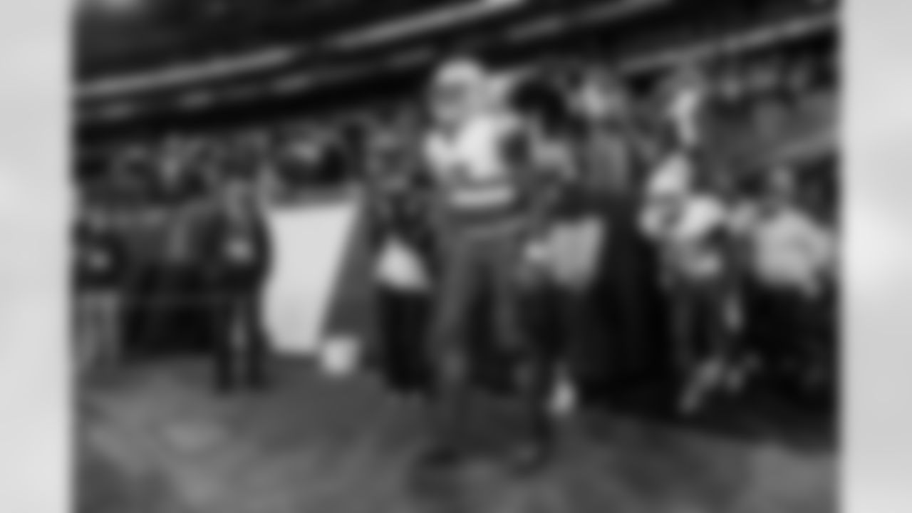 Check out the best shots from the Chargers Wild Card matchup against the Patriots!