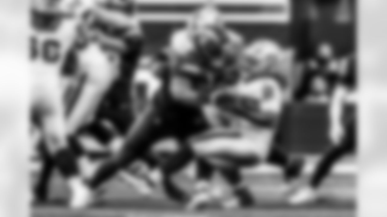 Take a look back at the Chargers Week 13 matchup with the Raiders in monochrome.
