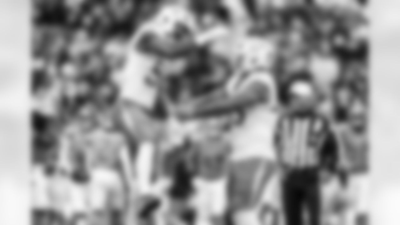 OLB Odafe Oweh (98) and OLB Tuli Tuipulotu (45)