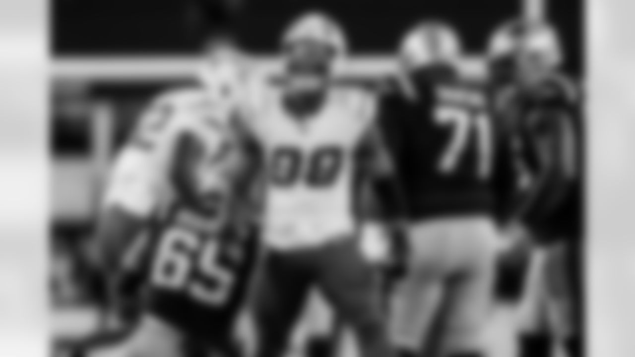 Check out the best shots from the Chargers Wild Card matchup against the Patriots!