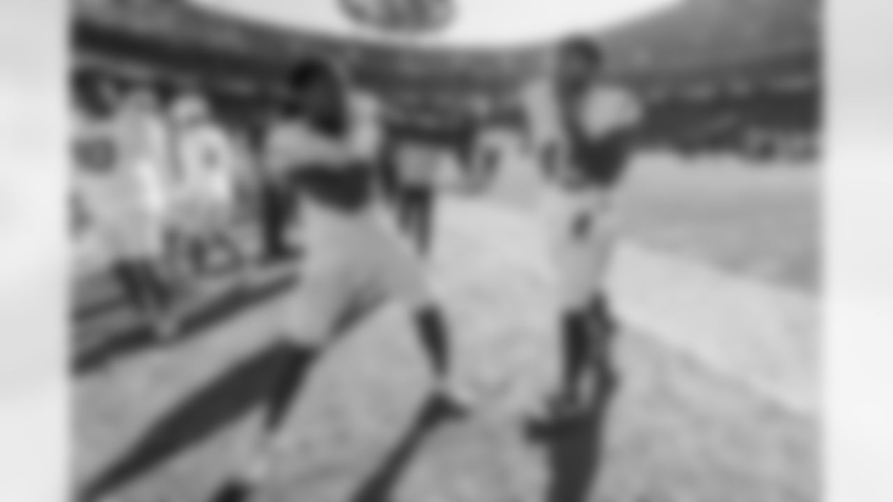 Take a look back at the best photos of Tuli Tuipulotu's 2025 campaign.