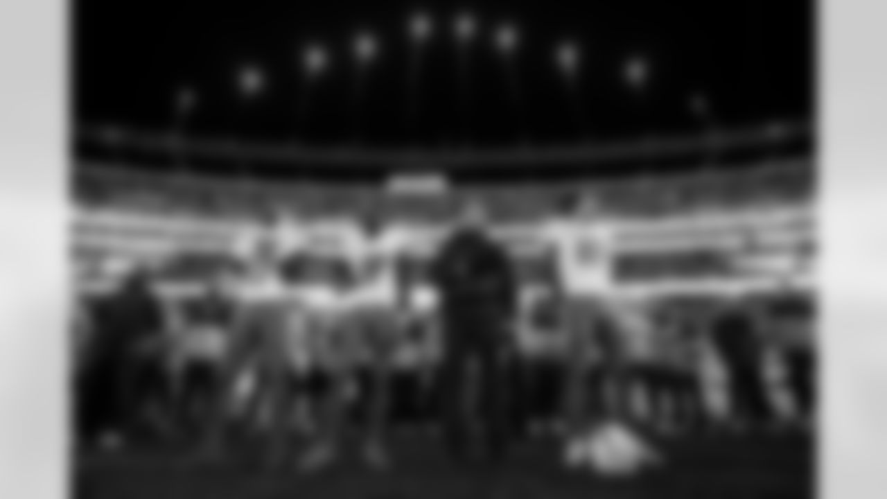 LB Daiyan Henley (0), S Derwin James Jr. (3), Head Coach Jim Harbaugh and QB Justin Herbert (10)