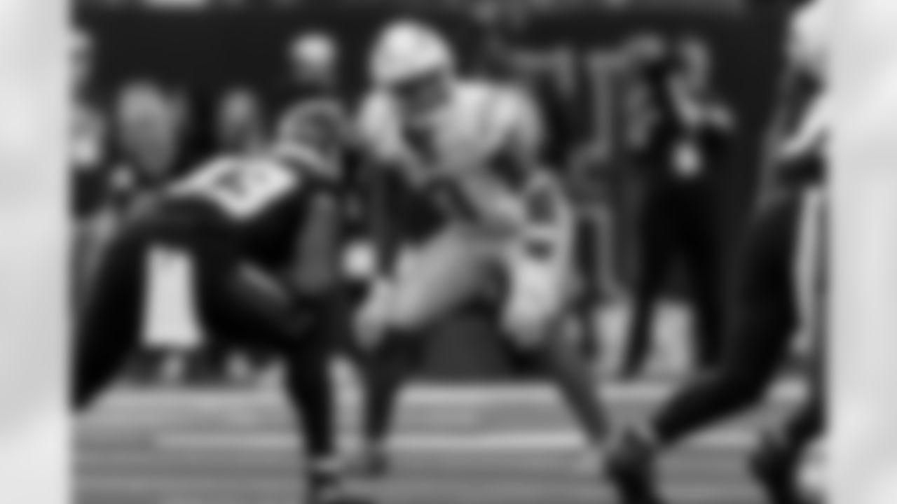 Check out the best shots from the Chargers Wild Card matchup against the Texans!
