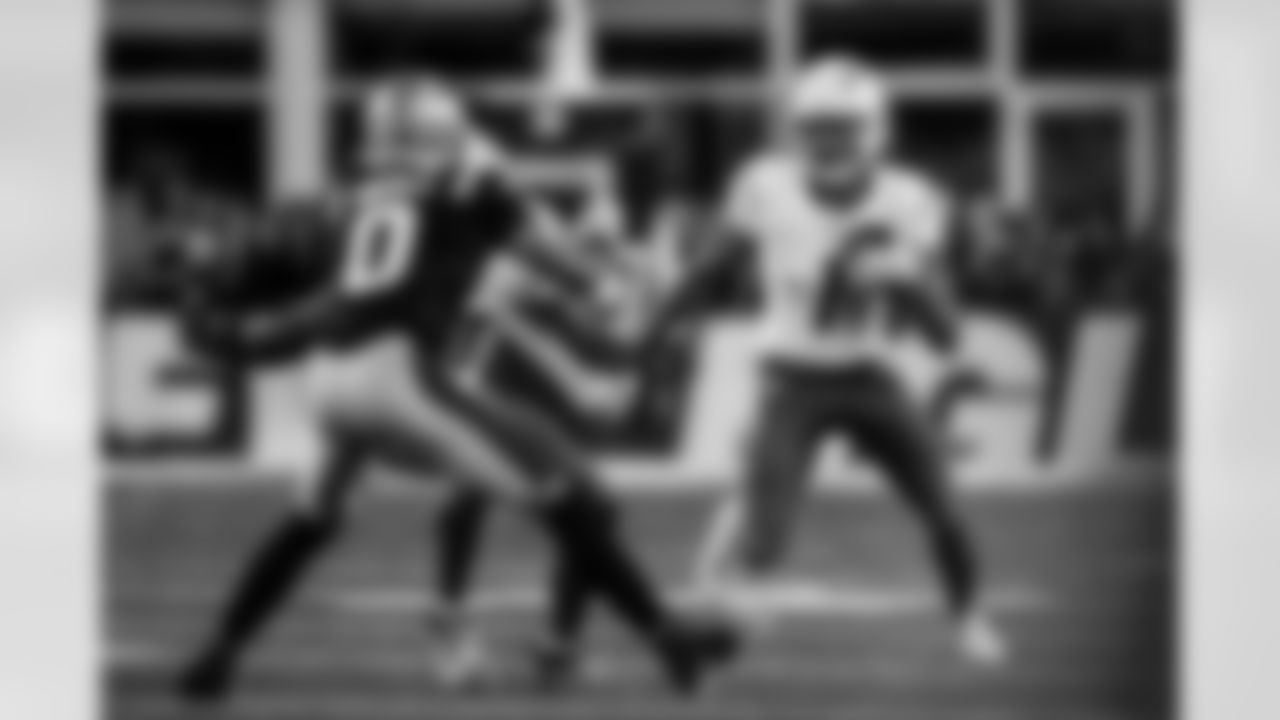 Check out the best shots from the Chargers Wild Card matchup against the Patriots!