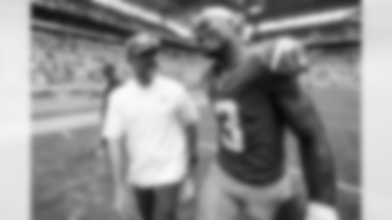 Defensive Coordinator Jesse Minter and S Derwin James Jr. (3)