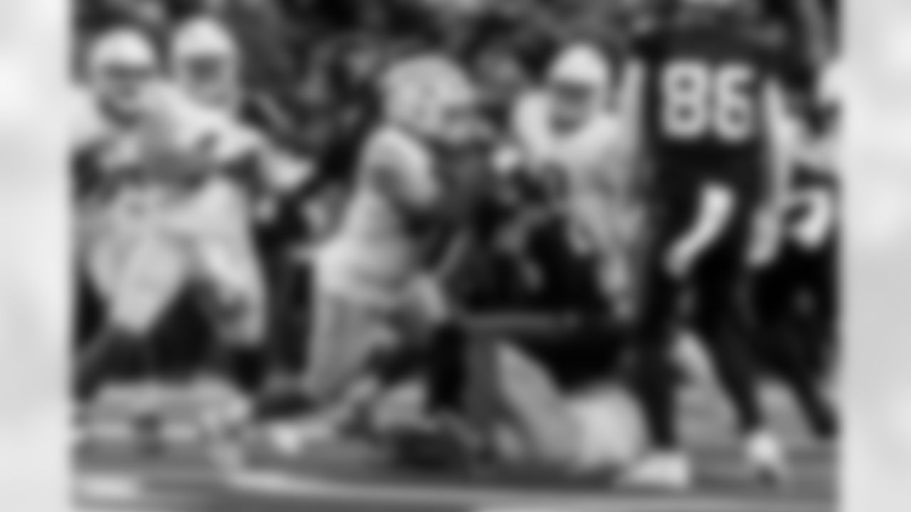 Check out the best shots from the Chargers Wild Card matchup against the Texans!