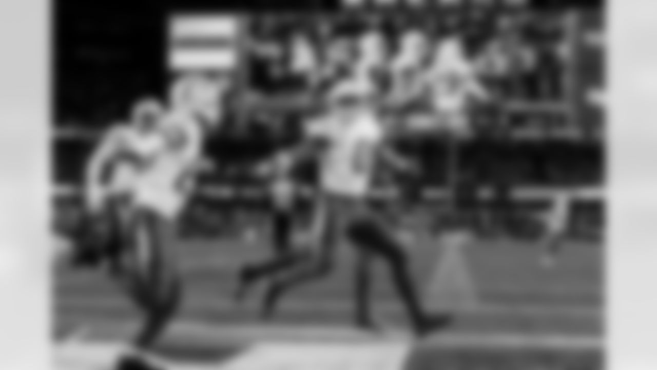 Check out the best shots from the Chargers Wild Card matchup against the Patriots!