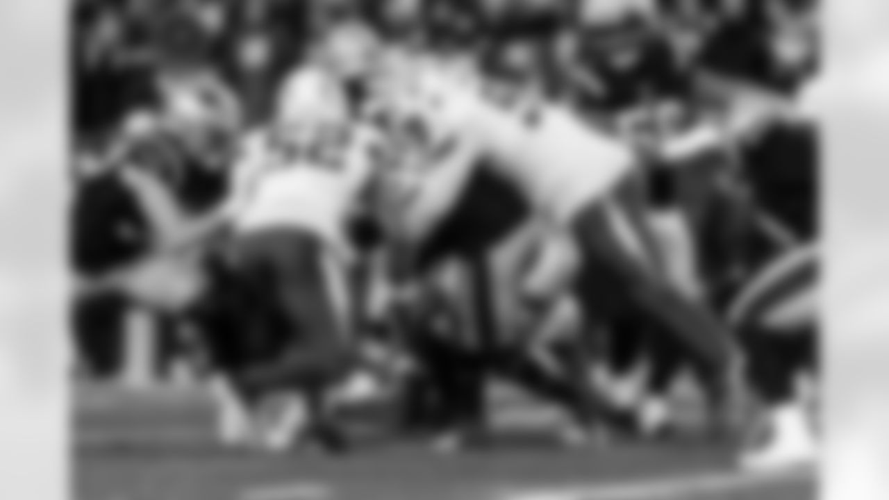 Check out the best shots from the Chargers Wild Card matchup against the Patriots!