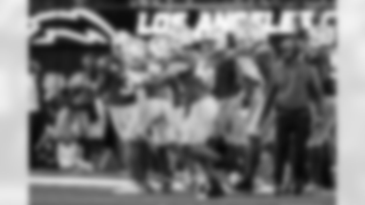 S RJ Mickens (27) and LB Troy Dye (43)