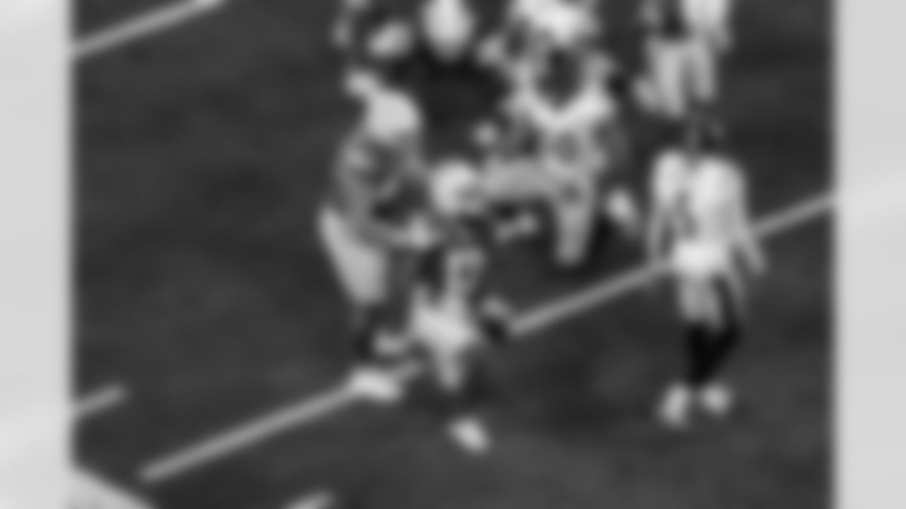 DL Scott Matlock (44) and WR Keenan Allen (13)