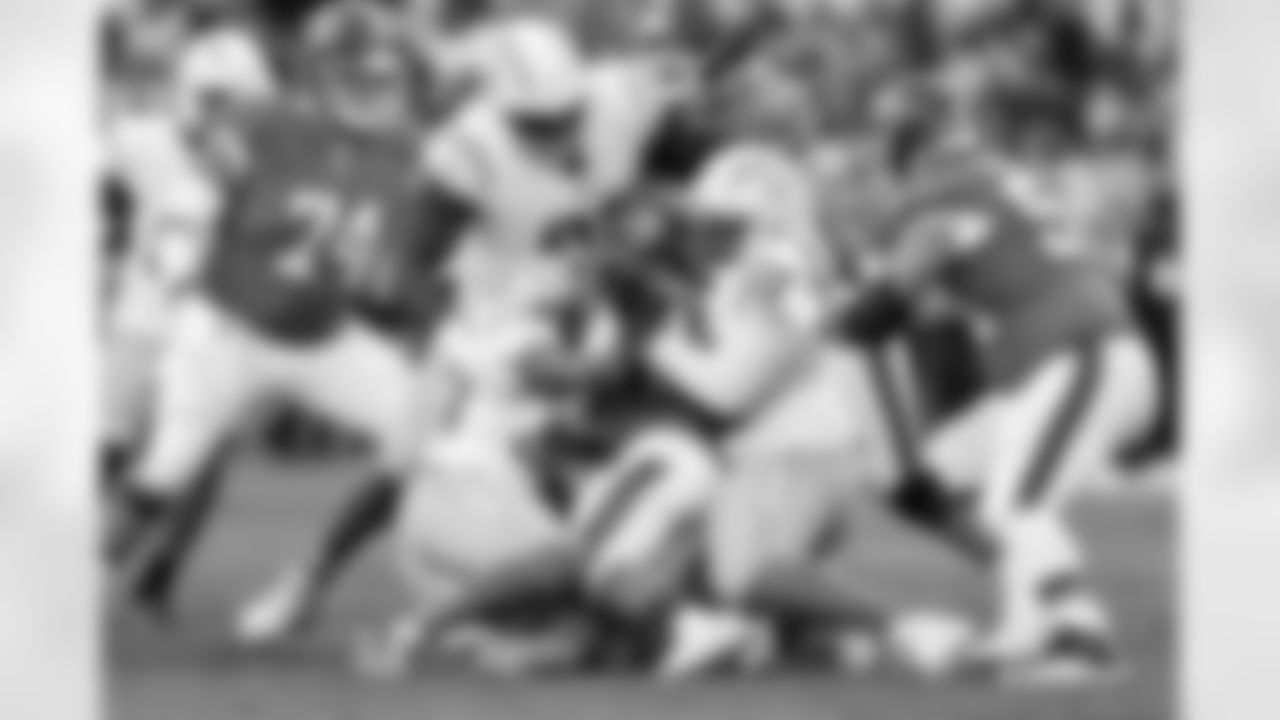 DL Otito Ogbonnia (93), LB Del'Shawn Phillips (53) and DT Jamaree Caldwell (99)