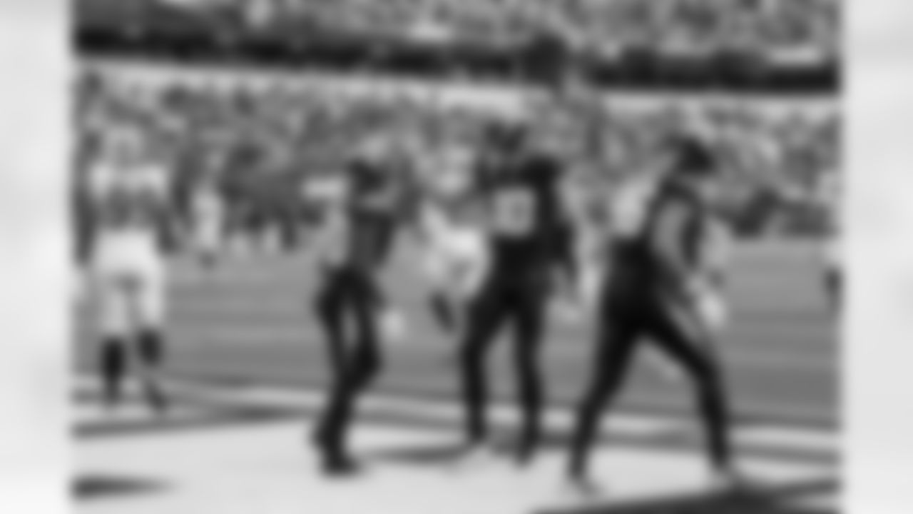 RB Kimani Vidal (30) and QB Justin Herbert (10)