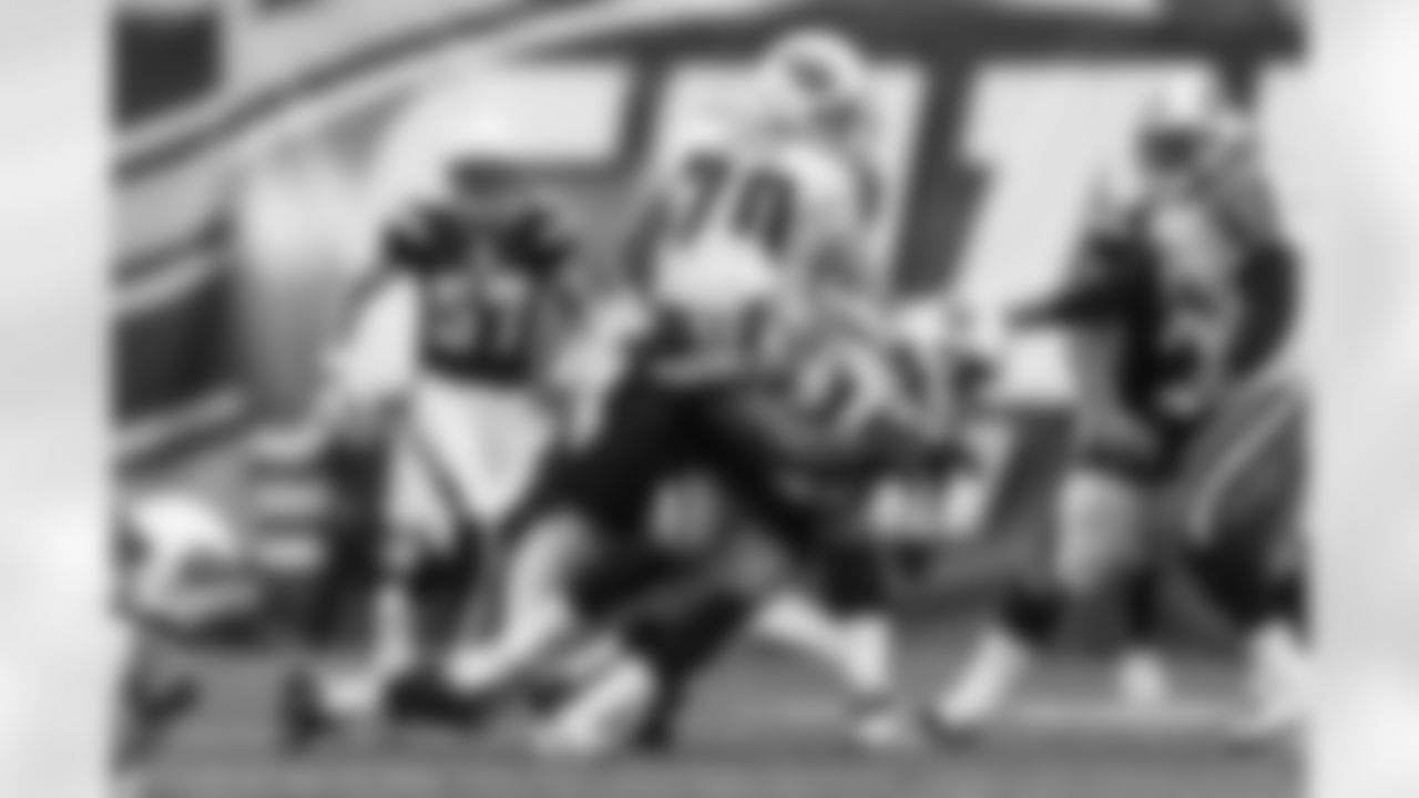 Relive the Chargers' postseason appearances through images from playoff games, highlighting the moments that defined the team in the NFL playoffs.