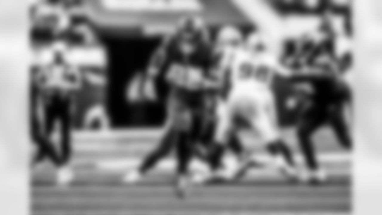 Take a look back at the Chargers Week 13 matchup with the Raiders in monochrome.