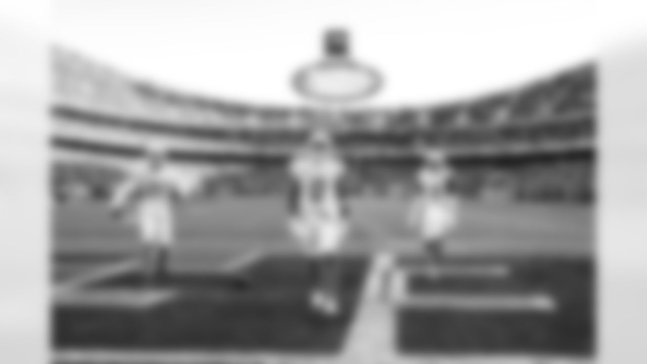 CB Cam Hart (20), LB Daiyan Henley (0) and S Derwin James Jr. (3)