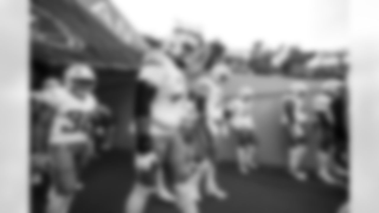 RB Jaret Patterson (32), T Trey Pipkins III (79) and T Joe Alt (76)