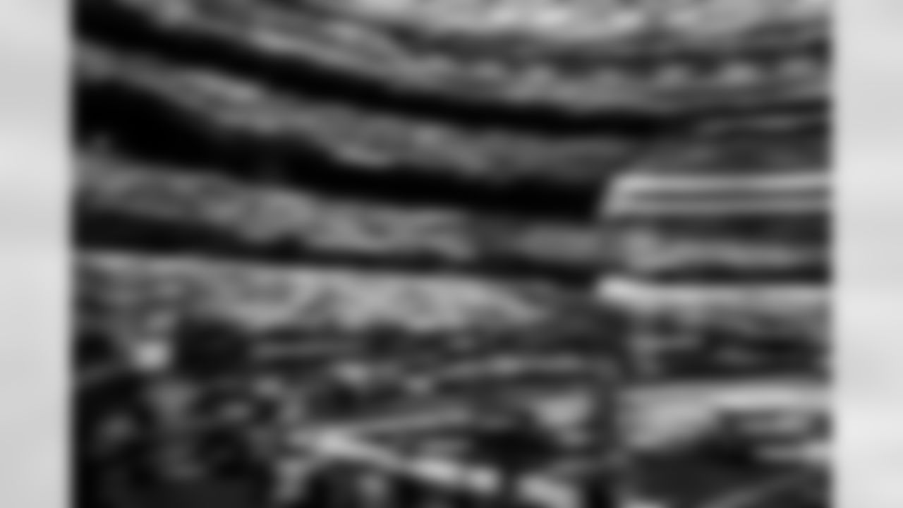 Center of the Blur - Keeping it with the pregame shots ahead of the regular season home finale in Week 17. I'm always assigned to shoot the player intros from Level 2 and find different, unique ways to capture the moment. Here, it's shot at 1/6 of a second with a 10-stop neutral density filter on and panned as the exact speed Elijah Molden was running out. With the focus point on him, he stays in focus while the rest of the scene blurs out.