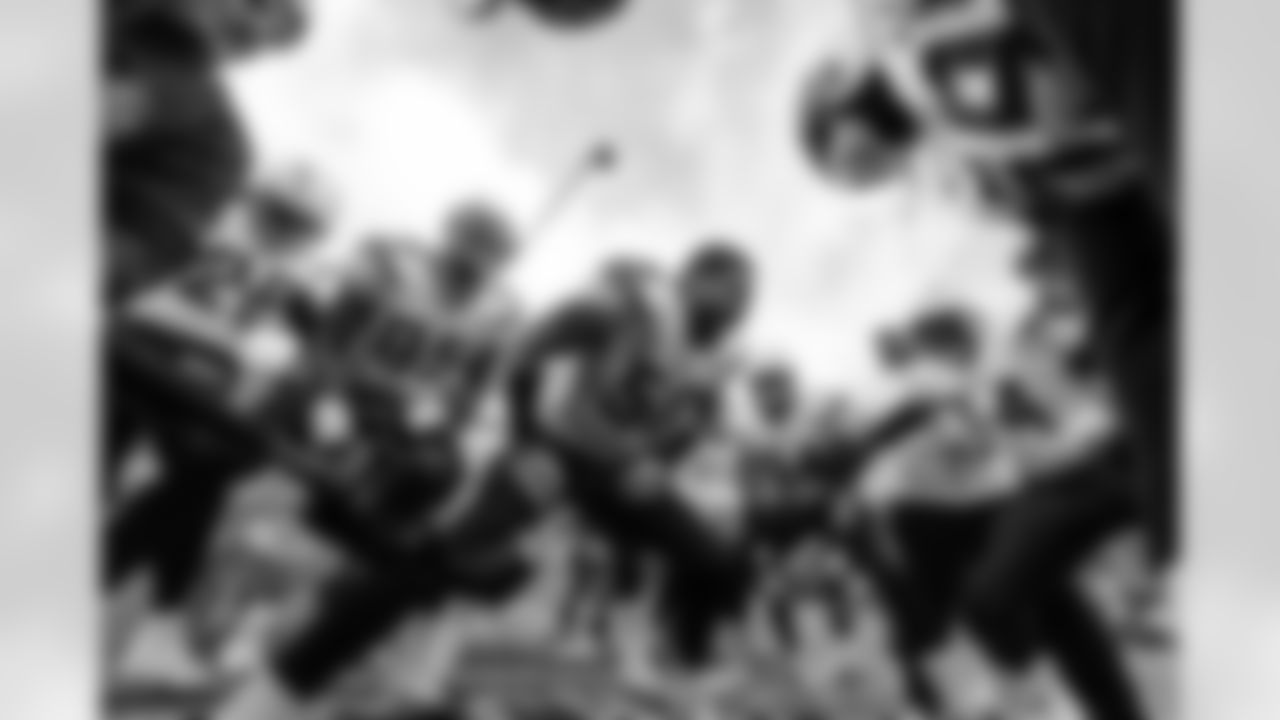 Relive the Chargers' postseason appearances through images from playoff games, highlighting the moments that defined the team in the NFL playoffs.