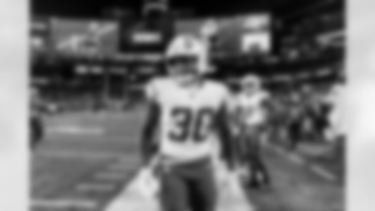 Check out the best shots from the Chargers Wild Card matchup against the Patriots!